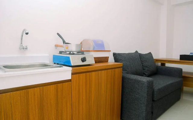 2BR Minimalist Bassura City Apartment By Travelio