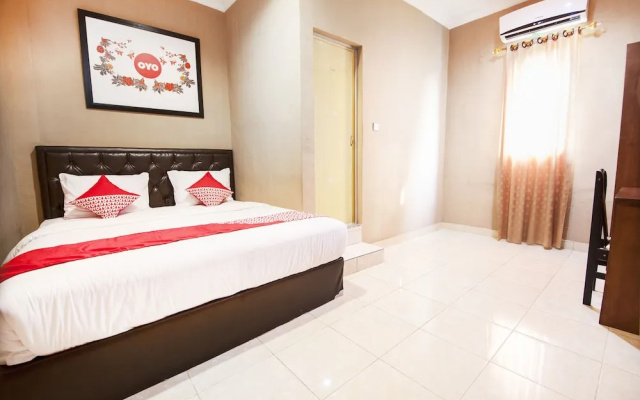Coin Mulia Hotel By OYO Rooms