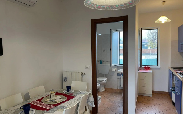 Snug holiday home in Loano with shared pool