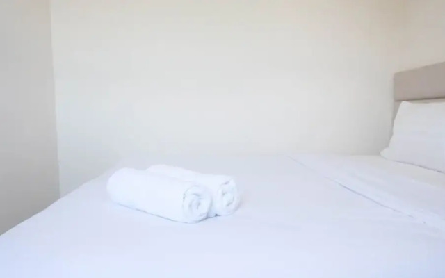 Modern And Homey 2Br At Puncak Kertajaya Apartment