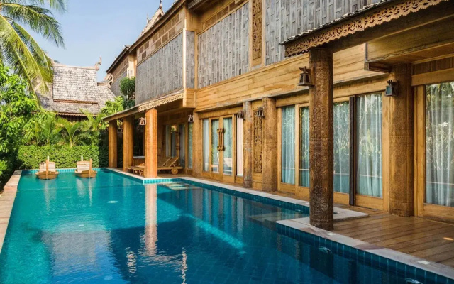 Курортный отель Santhiya Phuket Natai Resort & Spa