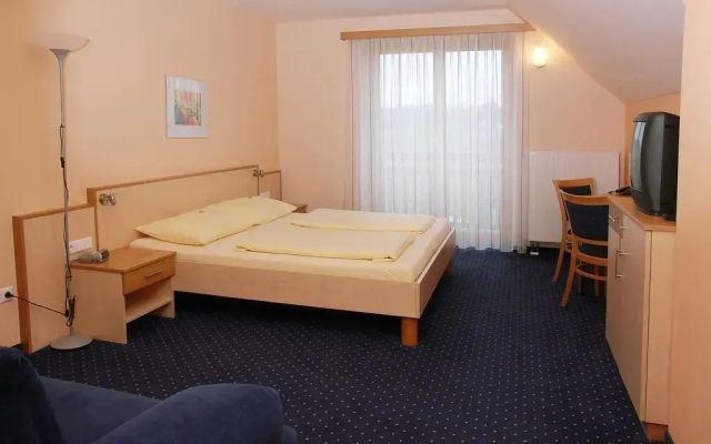 Golfblick - Zimmer & Apartments