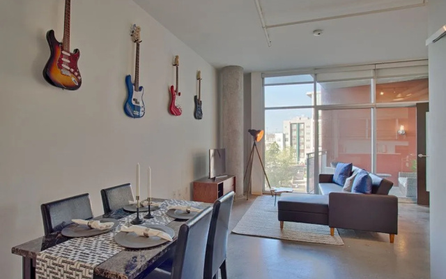 Industrial Chic Condo with Balcony