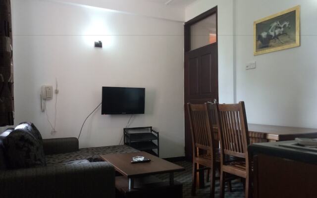 Апартаменты Everglow Apartment комната для гостей