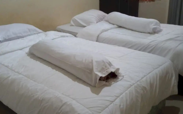Hotel O Neva Guest House SyariahNearWaduk Cipta Karya