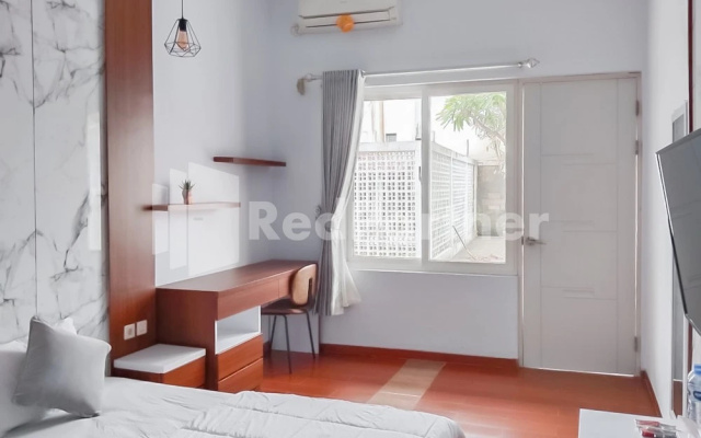Khayrizsan Guest House Mitra RedDoorz