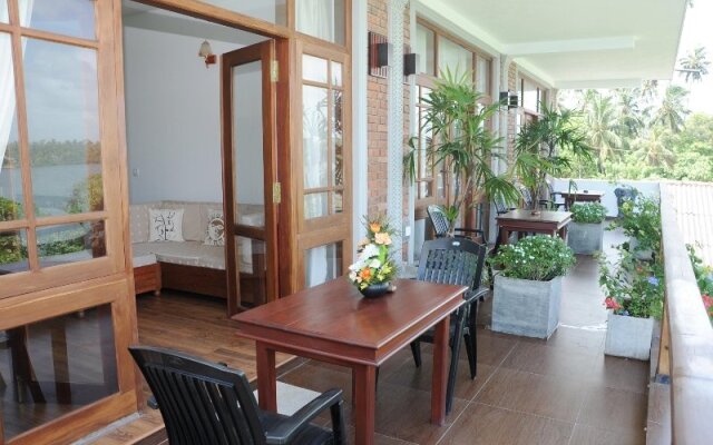 Отель Thumbelina Apartments & Hotel Шри-Ланка, Бентота - отзывы, цены и фото номеров - забронировать отель Thumbelina Apartments & Hotel онлайн вид на фасад