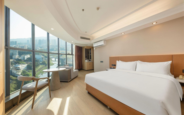 Vienna Hotel Shenzhen Pingshan Highway Station