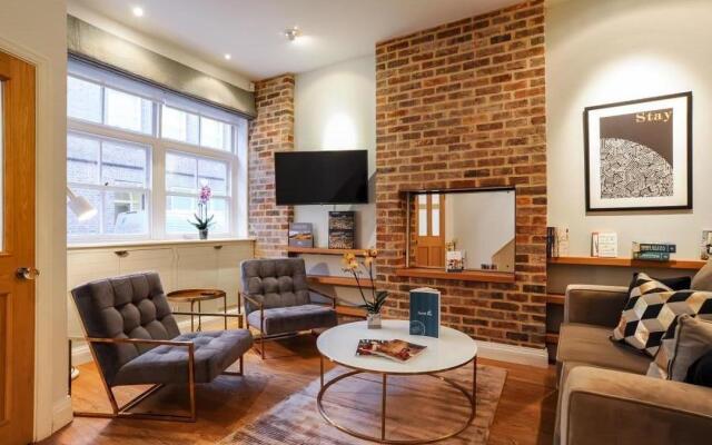 Апартаменты Sweet inn Apartments - Adam & Eve Лондон комната для гостей