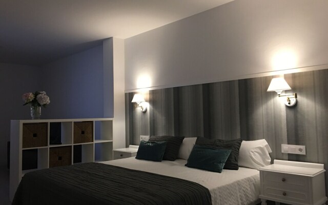 Отель Apartamentos Campana Эль-Грове комната для гостей