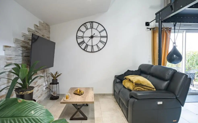 Loft avec jardin et parking privé