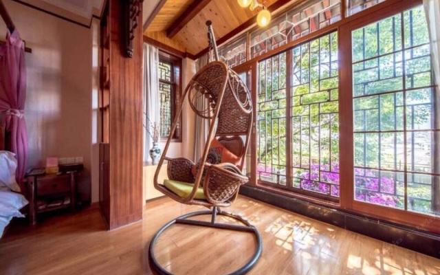 Lijiang Qianxuelou Hotel