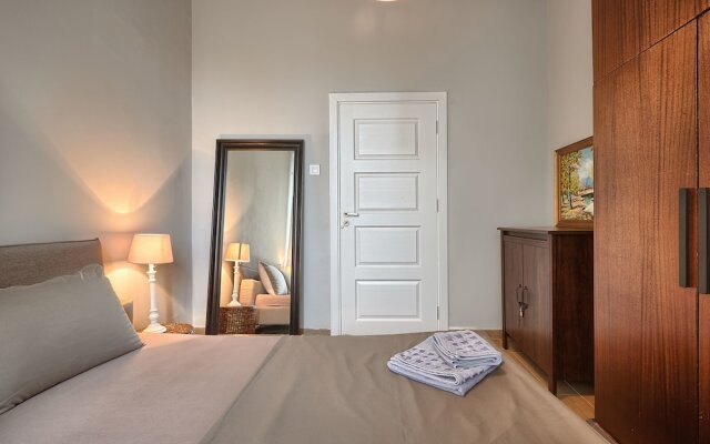 Апартаменты Baratero Downtown Apartment комната для гостей
