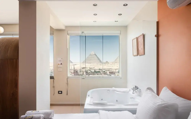 Xuru Stays I Jacuzzi Studios @ The Pyramids