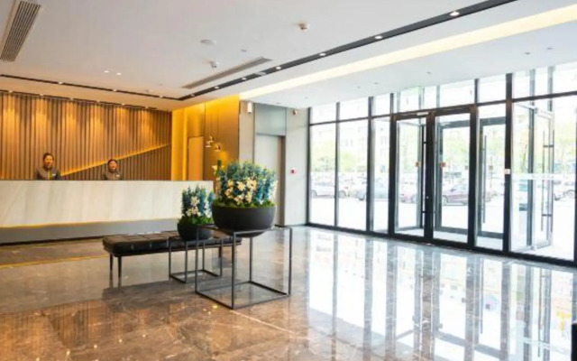 Home Inn Business & Travel Hotel (Ordos Wanda Wangfujing Branch)