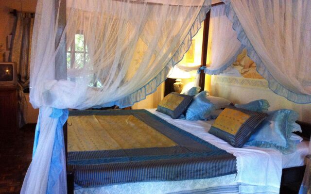 Отель African House Resort комната для гостей