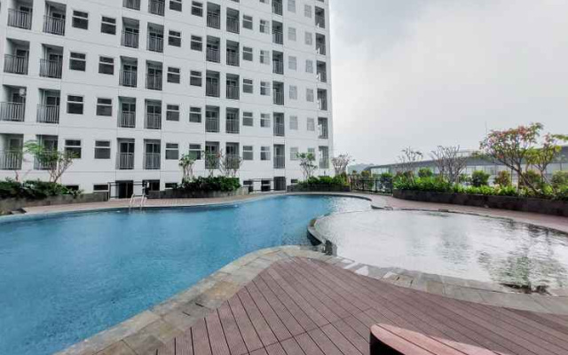 Cozy and Chic Studio at Serpong Garden Apartment By Travelio