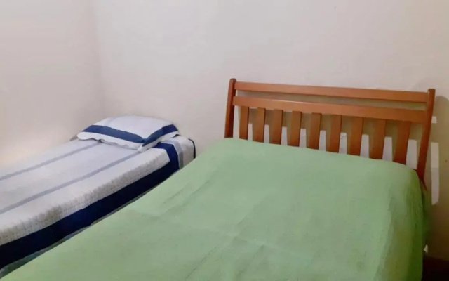 Casa da mata com piscina natural em condomínio
