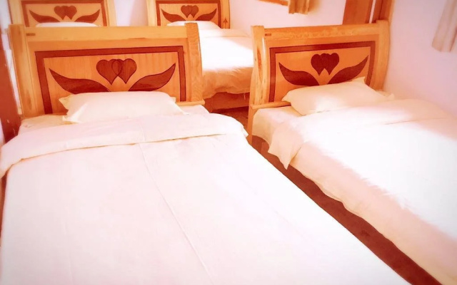 Daocheng Mizang Hostel