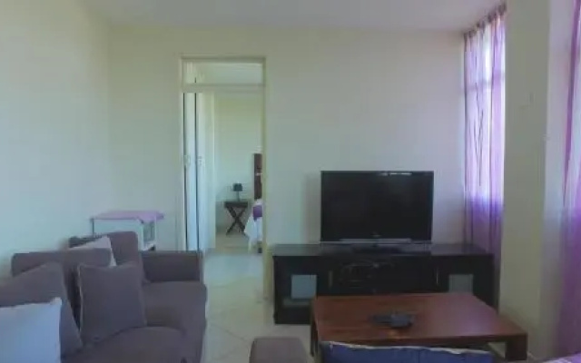 Shangri LA Apartment 208 & 803