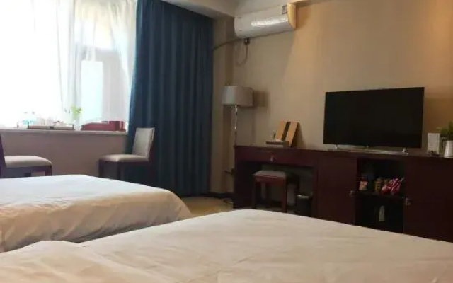 Mangshi Huayou Business Hotel