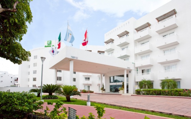 Отель Holiday Inn Cancun Arenas Мексика, Канкун - отзывы, цены и фото номеров - забронировать отель Holiday Inn Cancun Arenas онлайн вид на фасад