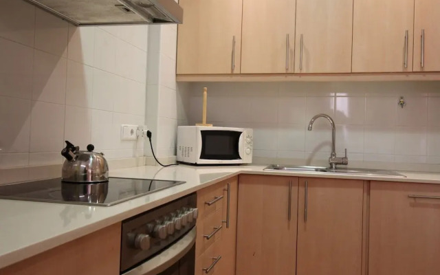 Apartamento con terraza al lado de la playa