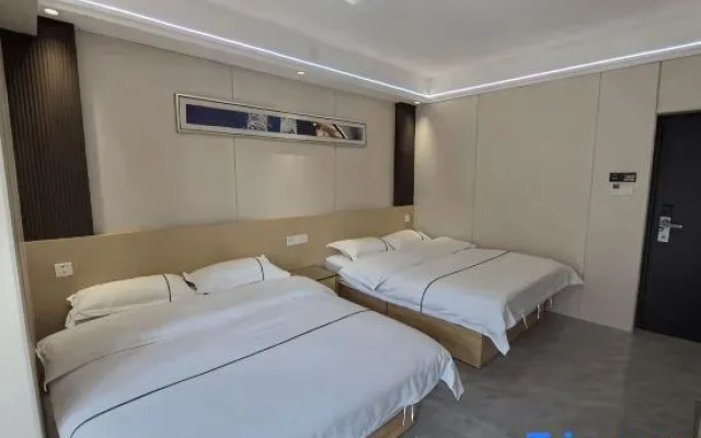 Ruxin Business Hotel (Chengwu Shengshi International Building Materials City)