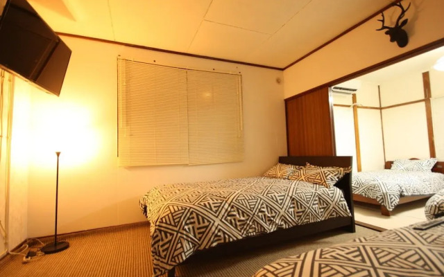 Sapporo Dome Front House