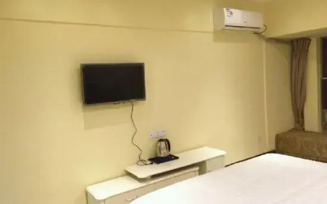 City Xinjia Apartment Hotel