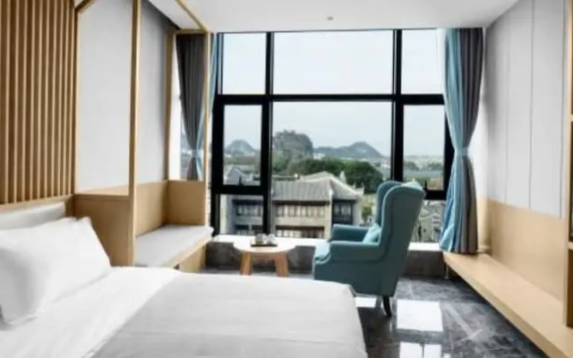 Guilin Gangshe Hotel East&West Alley