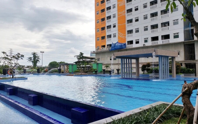 Relaxing and Warm 2BR @ Green Pramuka City Apartment