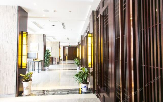 Taihu Xiangting Meicheng Holiday Hotel вид на фасад