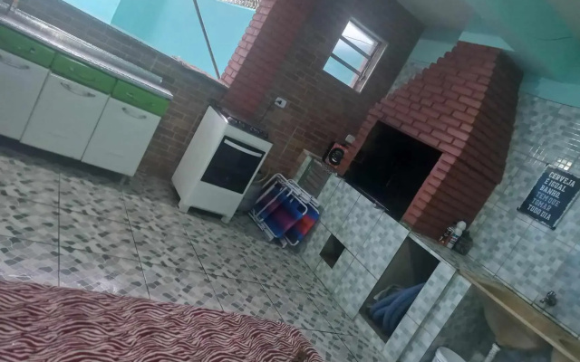 CASA DE PRAIA CARAGUA COM Piscina