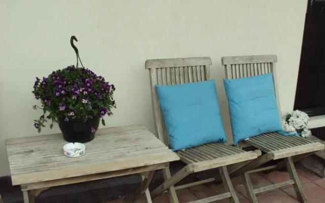 Logement De witte klok