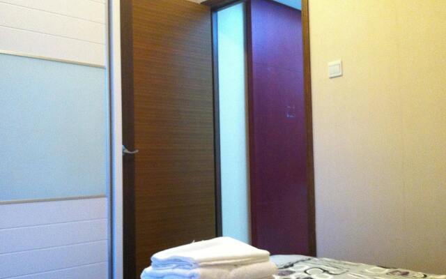 Апартаменты Xinyage Apartment комната для гостей