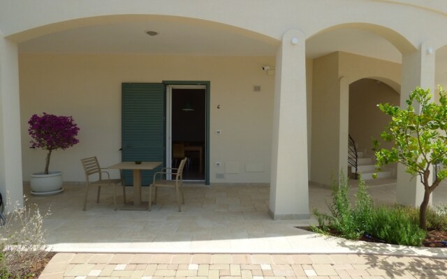 Отель Residence Il Colle Порто Чезарео вид на фасад
