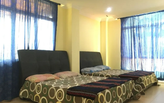 SPOT ON 89857 Azra Inn Rumah Tumpangan