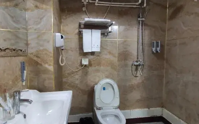 Qufu Wan'ai Theme Homestay (Jining College Commercial East Street Branch)