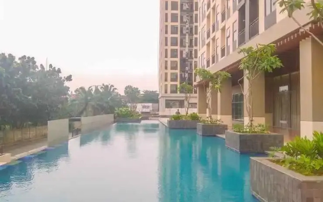 Cozy and Tidy Studio at Transpark Cibubur Apartment By Travelio