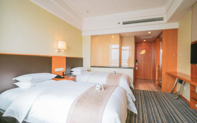 Отель Ramada Plaza by Wyndham Shanghai Pudong Airport