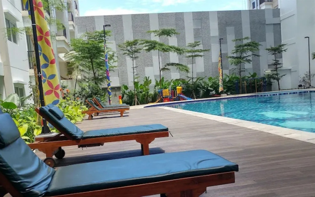 Homey and Minimalist Signature Park Grande Apartment