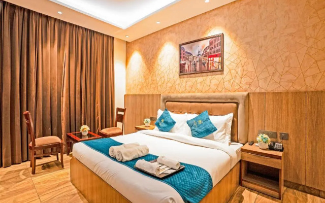 The Riverstone Inn - Near India Expo Centre and Mart