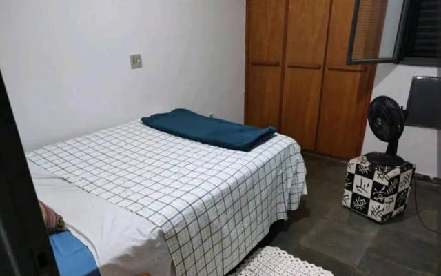 Canto aconchegante quarto privativo