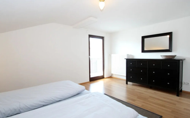 Quaint Chalet in Kirchberg with Terrace, Garden, Ski Storage