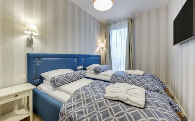 Апартаменты Lion Apartments -Aquarius Deluxe комната для гостей