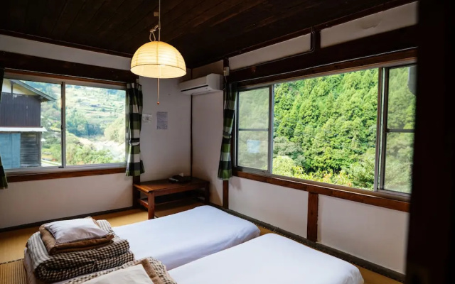 Guesthouse Momonga Village - Hostel