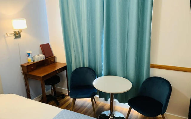 A Small Hotel Room for Mountain Lovers