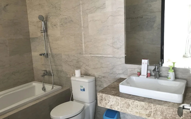 Luminous 2 Bedrooms at Menteng Park Apartment by Travelio