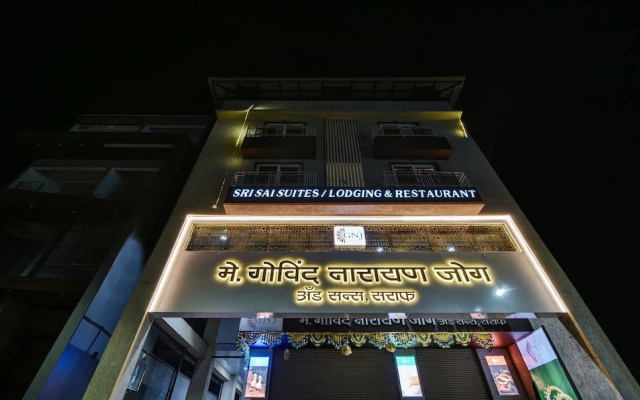 Treebo Shree Sai Suites - 2km from Mahalaxmi Temple